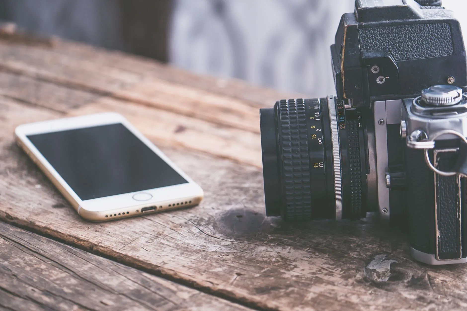 Smartphones laid out on a desk for comparison